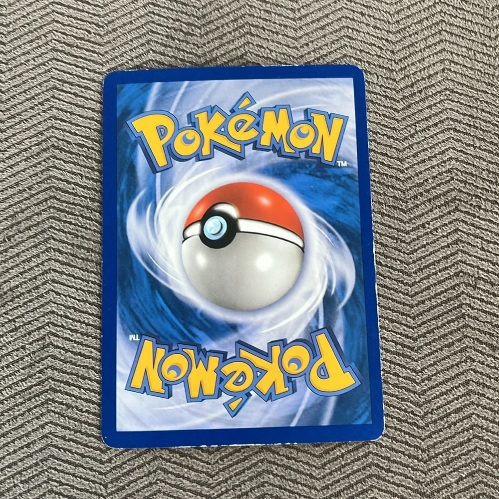 Unown 2005 purple Pokémon card